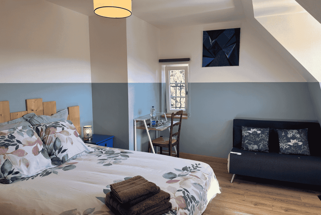 Les Cigognes de Rosheim - Chambre d'hôte la Cigogne Bleue - Vue du lit